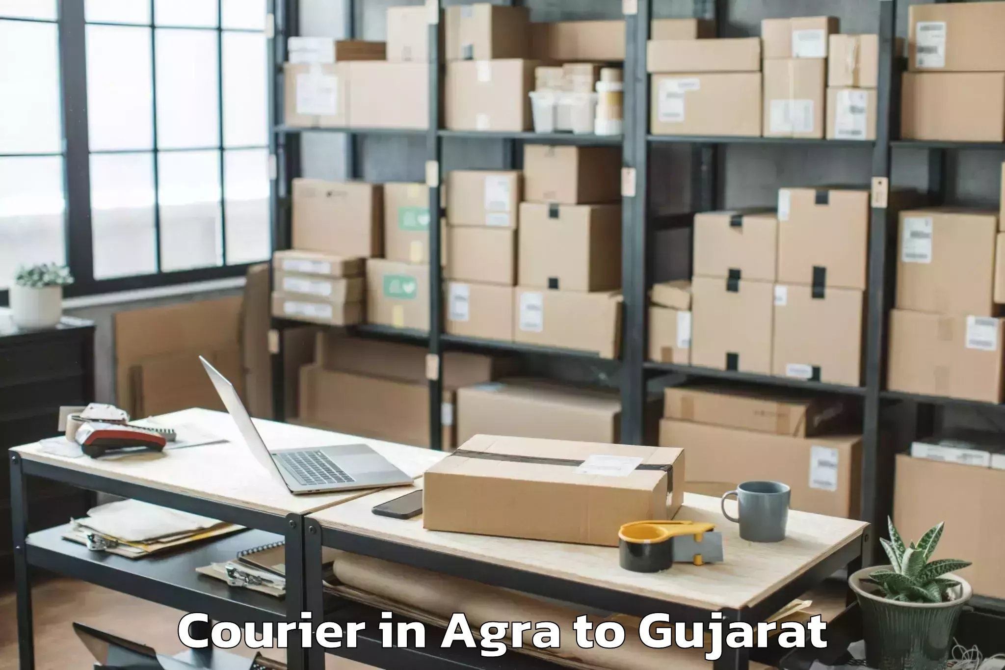 Leading Agra to Dhasa Courier Provider